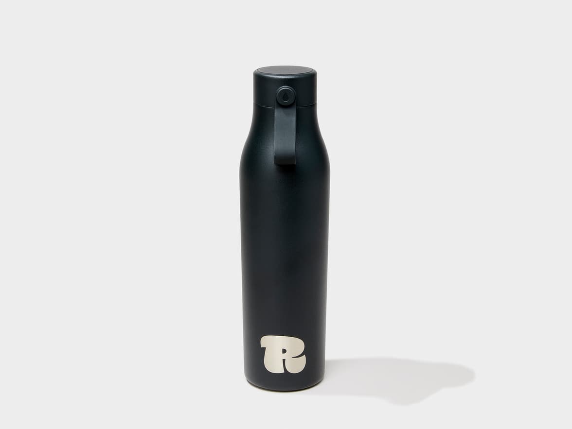 A jet black MOO water bottle with custom engraving.
