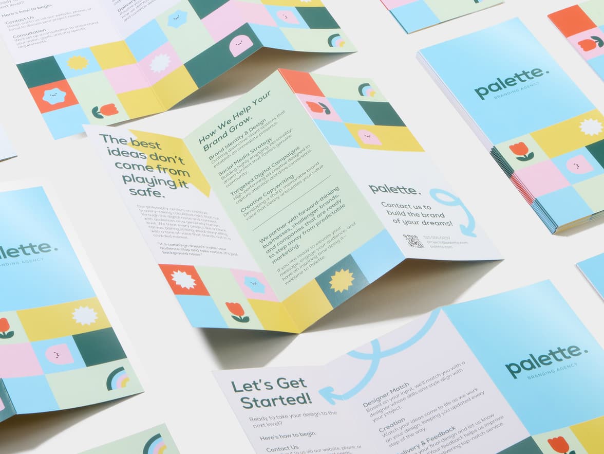 A collection of Z-Fold Original Gloss Brochures.