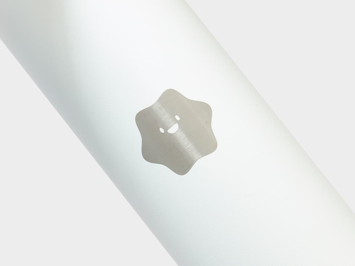 White bottle with a metallic Montblanc star logo.