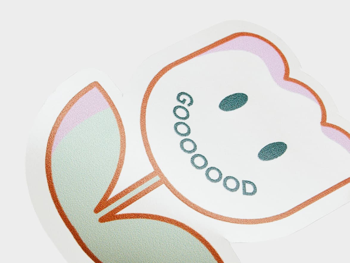A close up image of a customized clear die cut sticker that is in the design and shape of a flower.