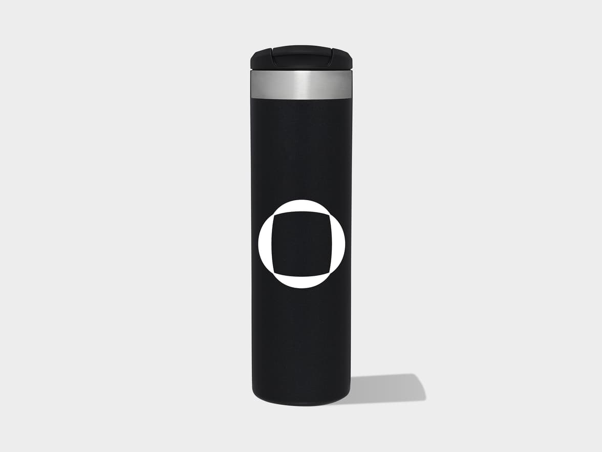 Black thermal travel mug with a white logo consisting of a circle enclosing a rounded square.