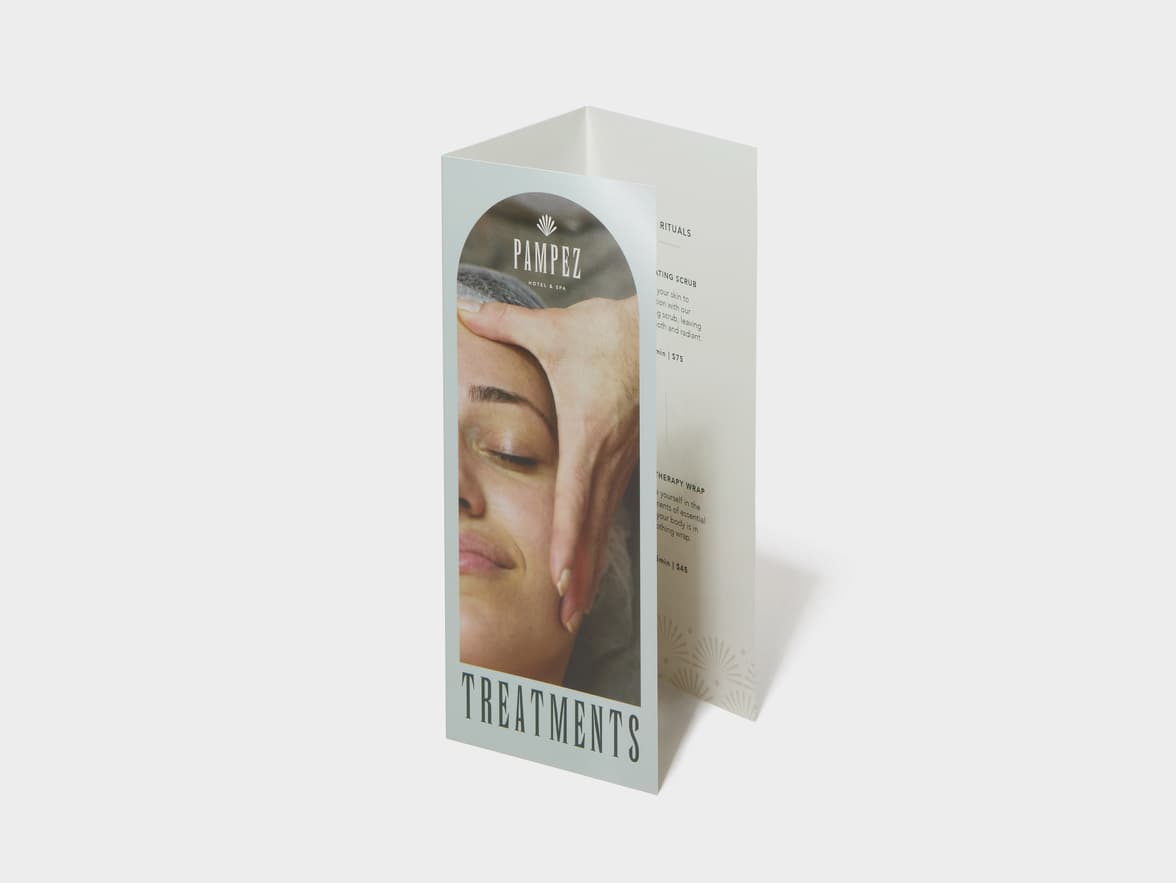 A Tri-Fold Original Gloss Brochure standing.