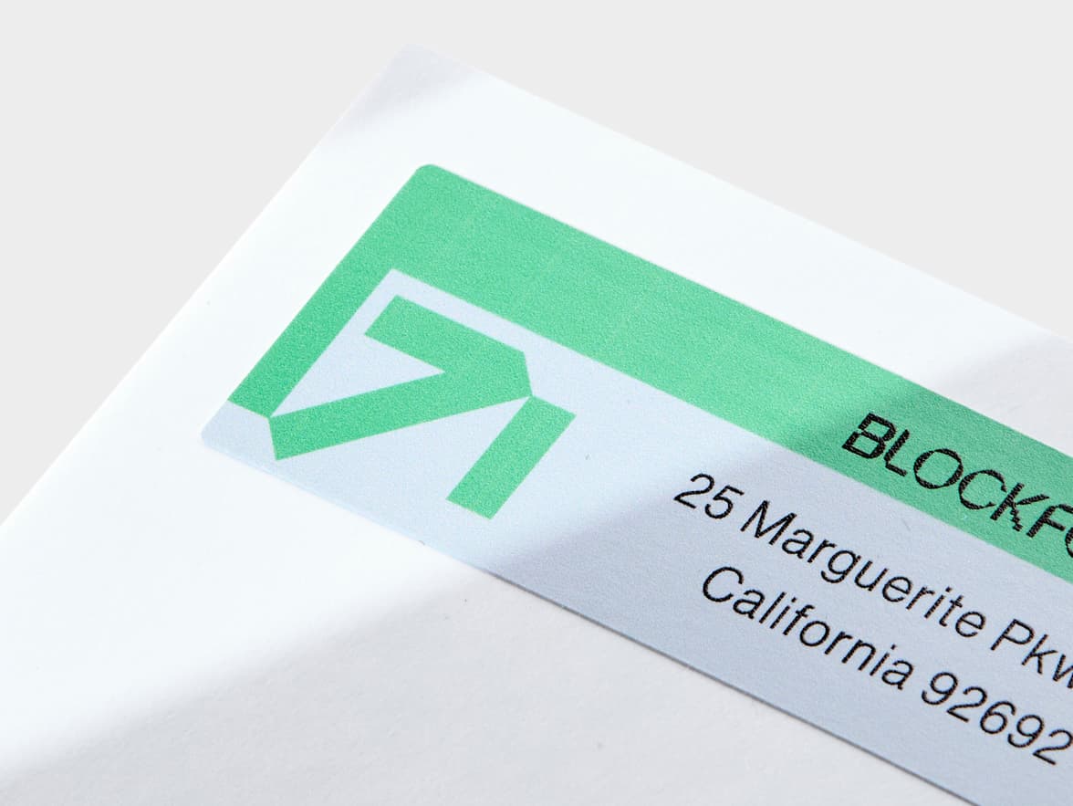 A close up image of the left hand side of a customized rectangular coated sticker.