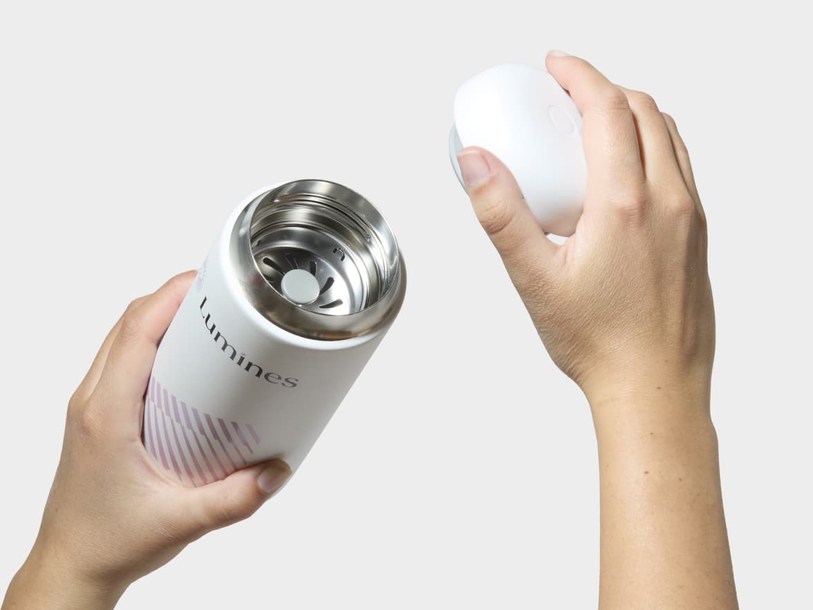 Hands Removing Lid From Matte White Fellow® Carter Move Mug With One-Sided Printing Customisation