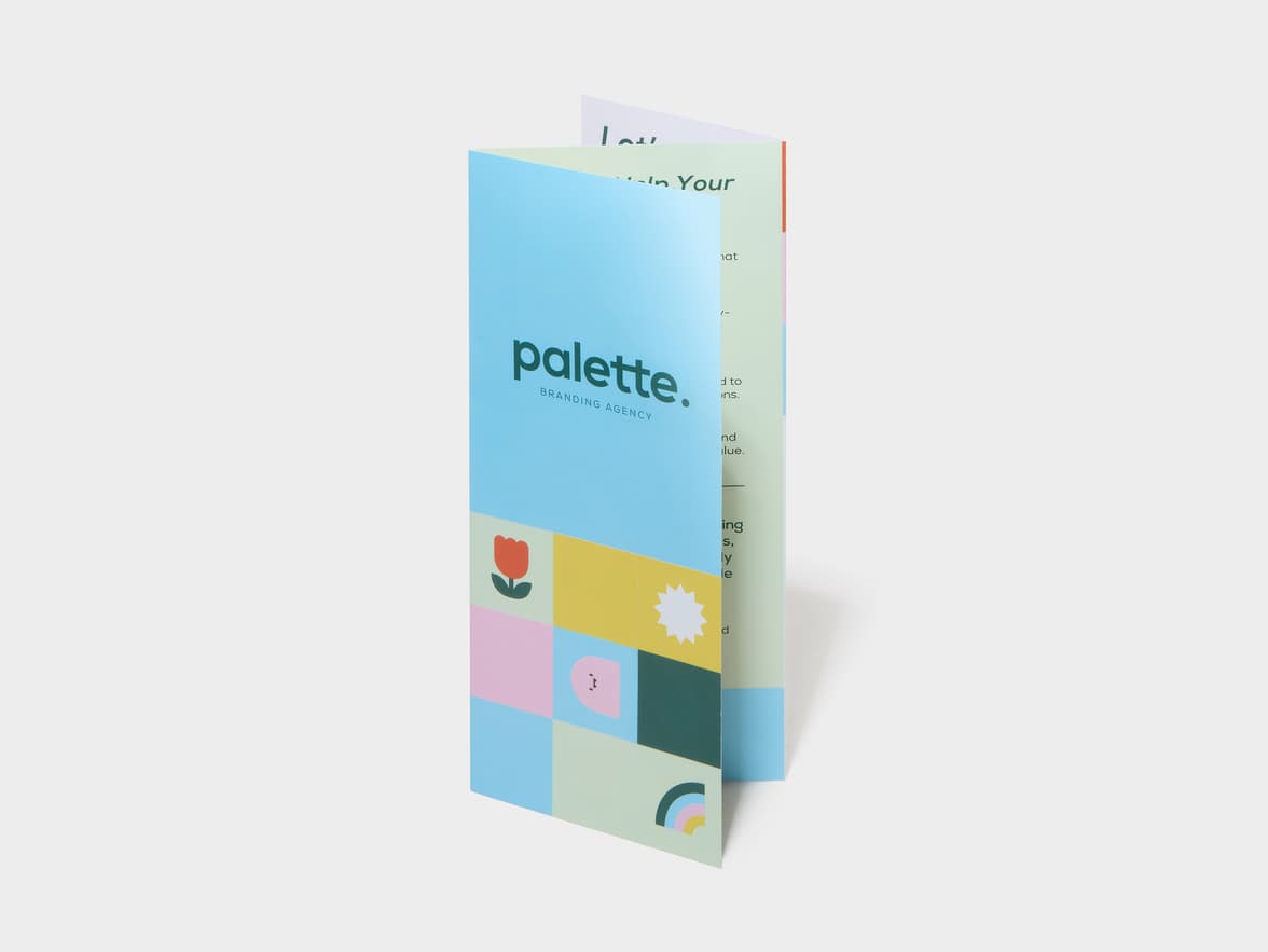 A Z-Fold Original Gloss Brochure standing.