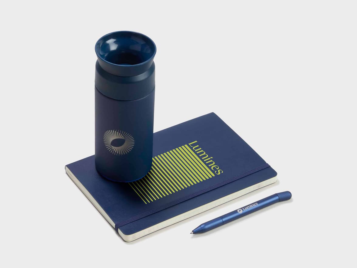 Collection shot of the LEUCHTTURM1917 Classic Softcover Notebook with a Tumbler and a Pen