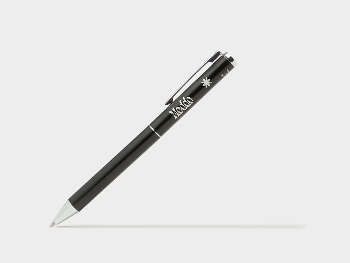 Black ballpoint pen with 'Meddo' branding and a star symbol.