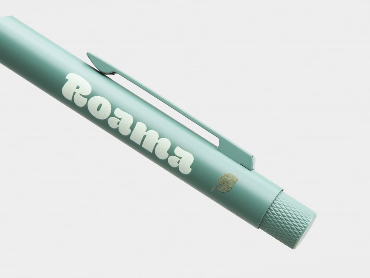 Light green Roama pen with a leaf logo.