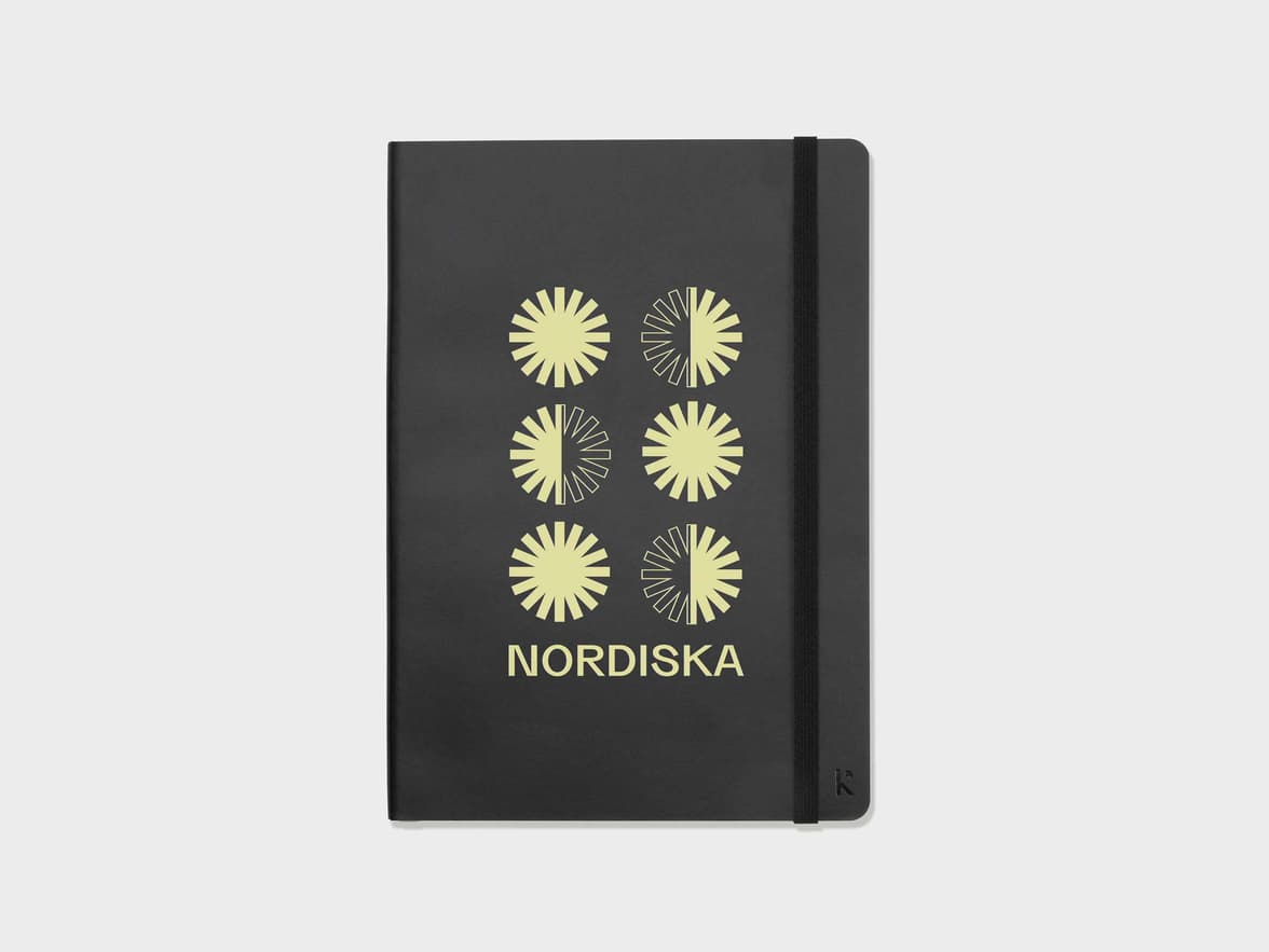 Face on shot of the Navy Karst Stone Paper Softcover Notebook with Single Colour Printing customization