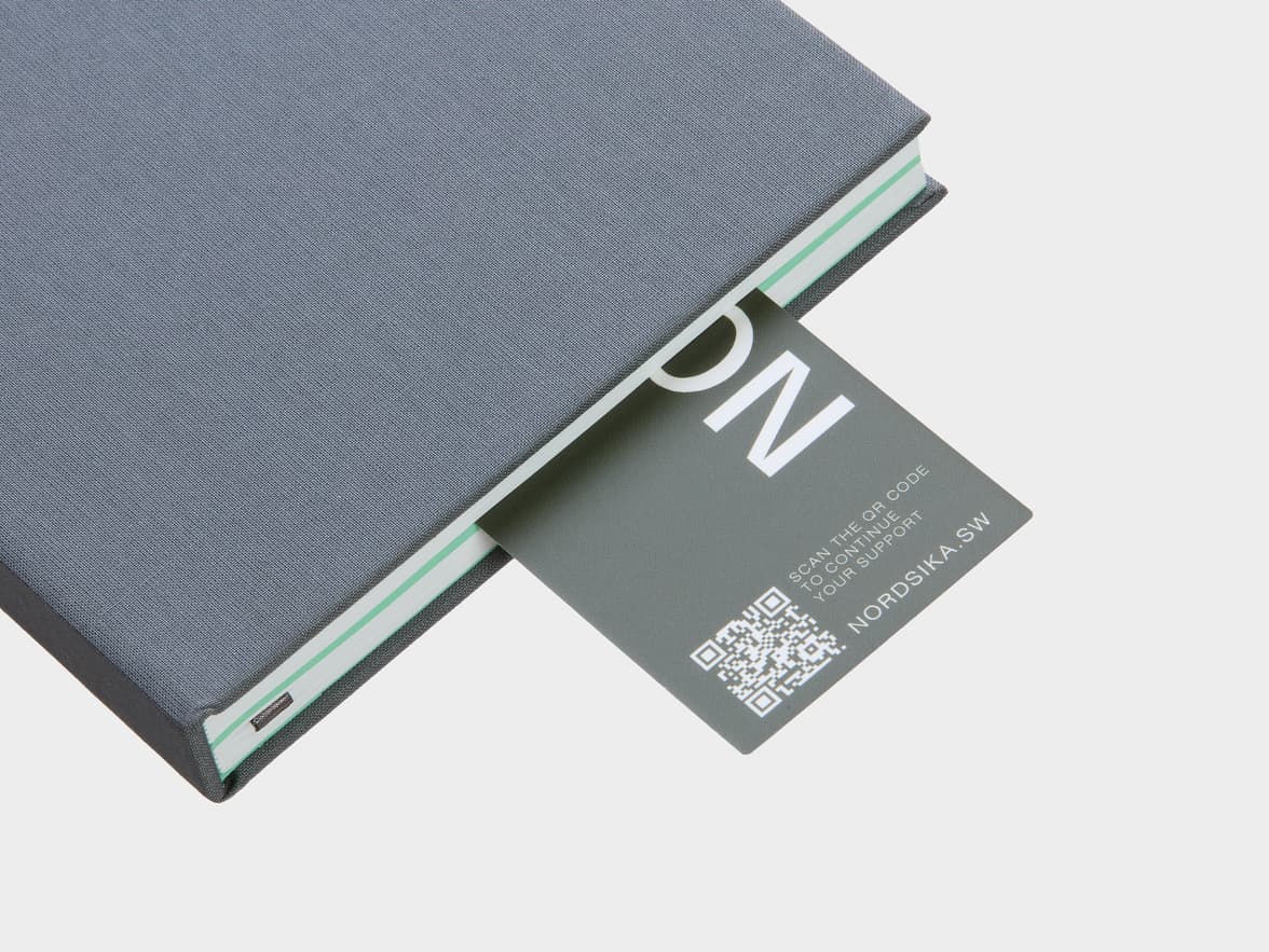 Original matte bookmark sticking out of book.