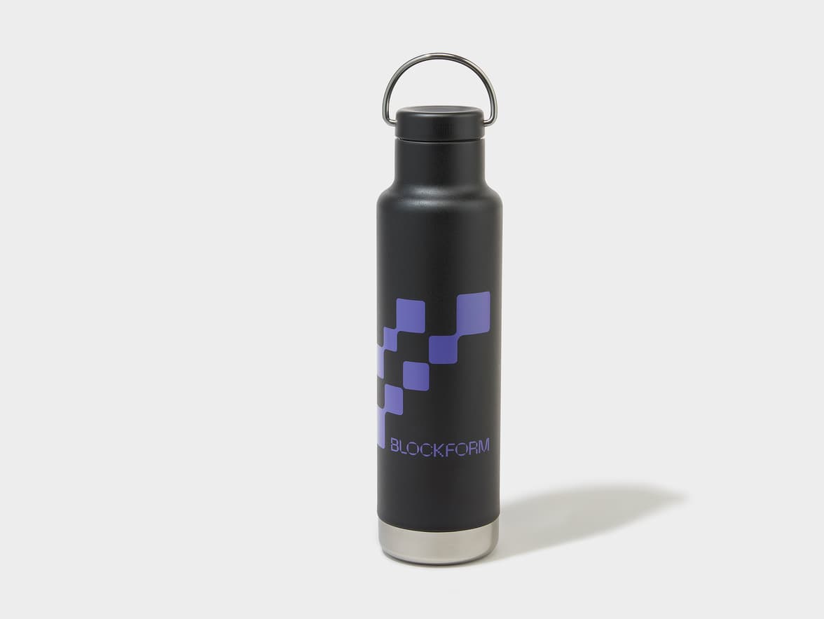 Black water bottle with a purple checkered pattern logo and "BLOCKFORM" text, a silver base, and a silver loop handle.