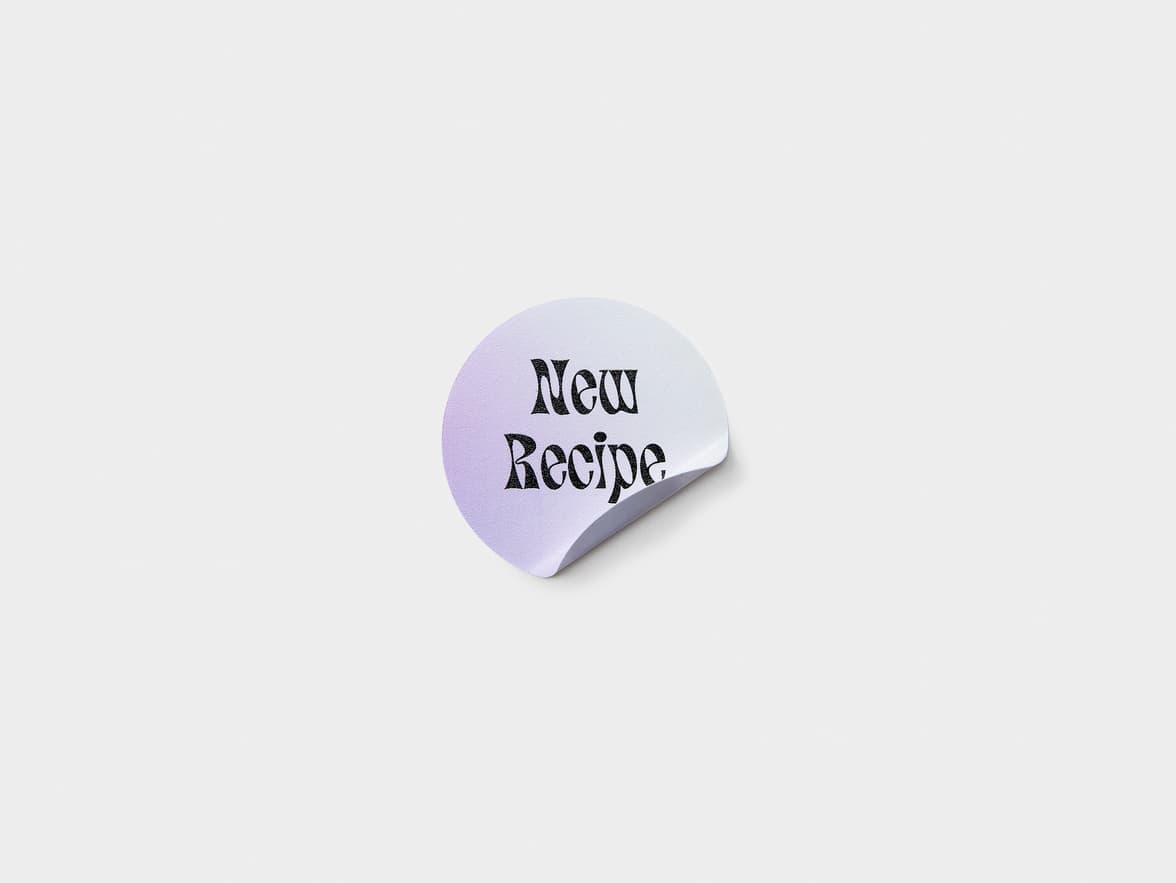A lilac customized round coated sticker.
