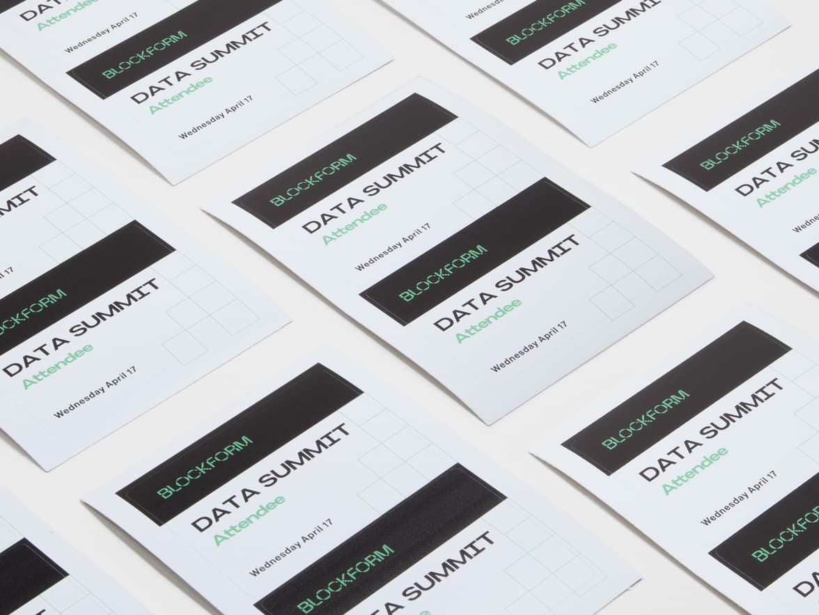 A collection of name tag styled customized rectangular coated stickers on sheets.