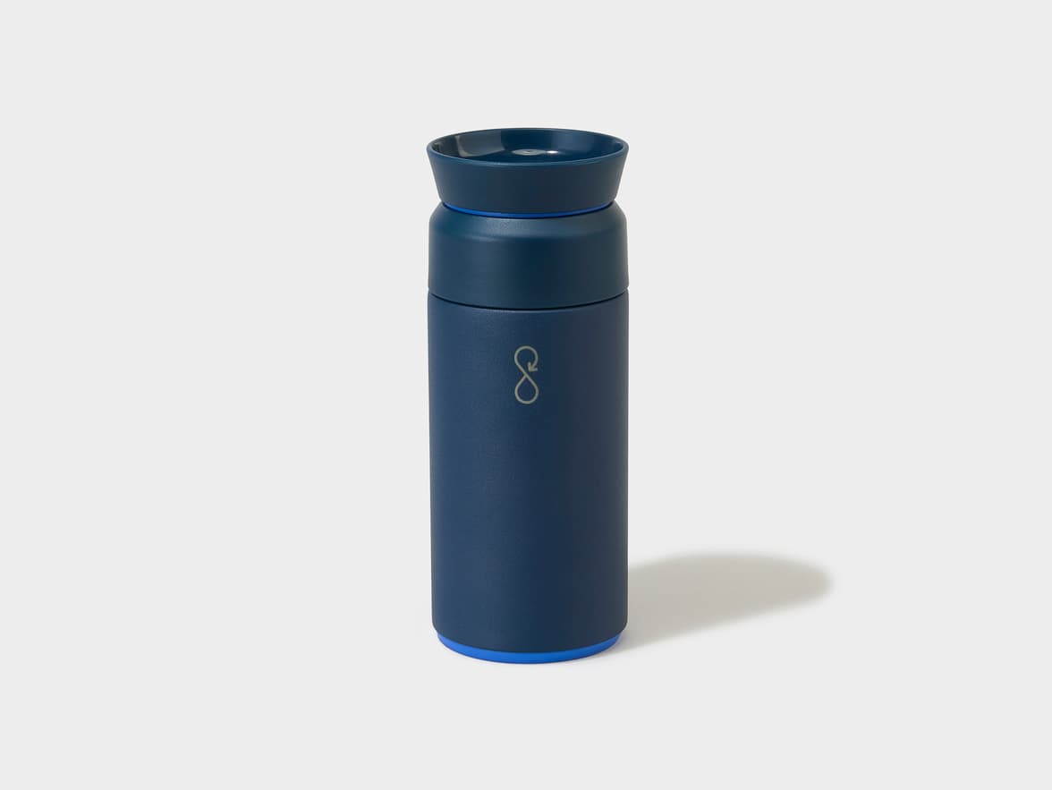 Dark blue reusable coffee cup with a light grey infinity loop logo.