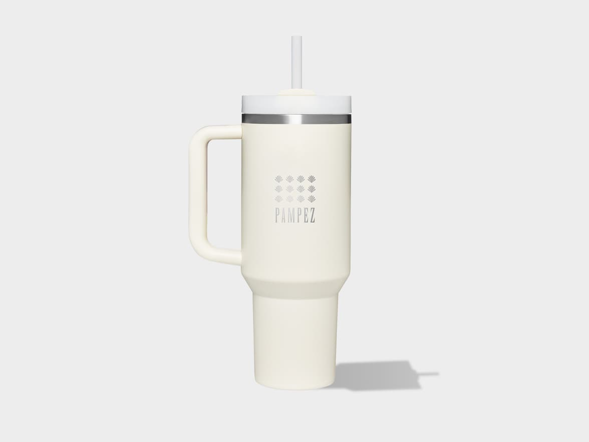 Creamy white PAMPEZ tumbler with a handle, lid, and straw on a light background.