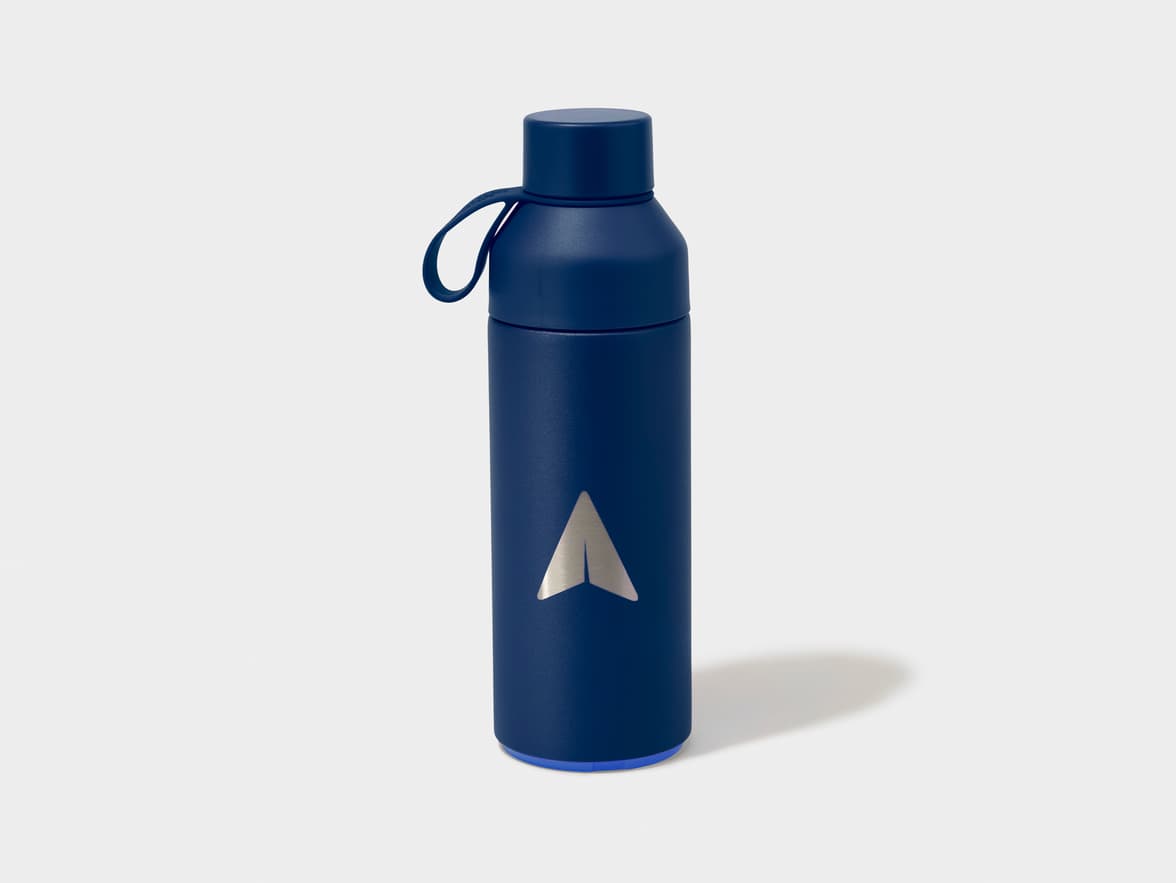Dark blue water bottle with a silver paper airplane logo.