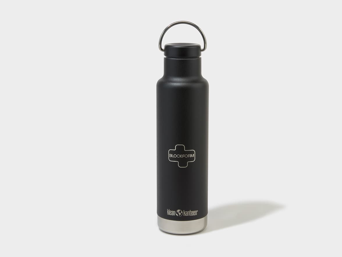 Black Klean Kanteen water bottle with a silver base, featuring "BLOCKFORM" and "klean kanteen" logos.