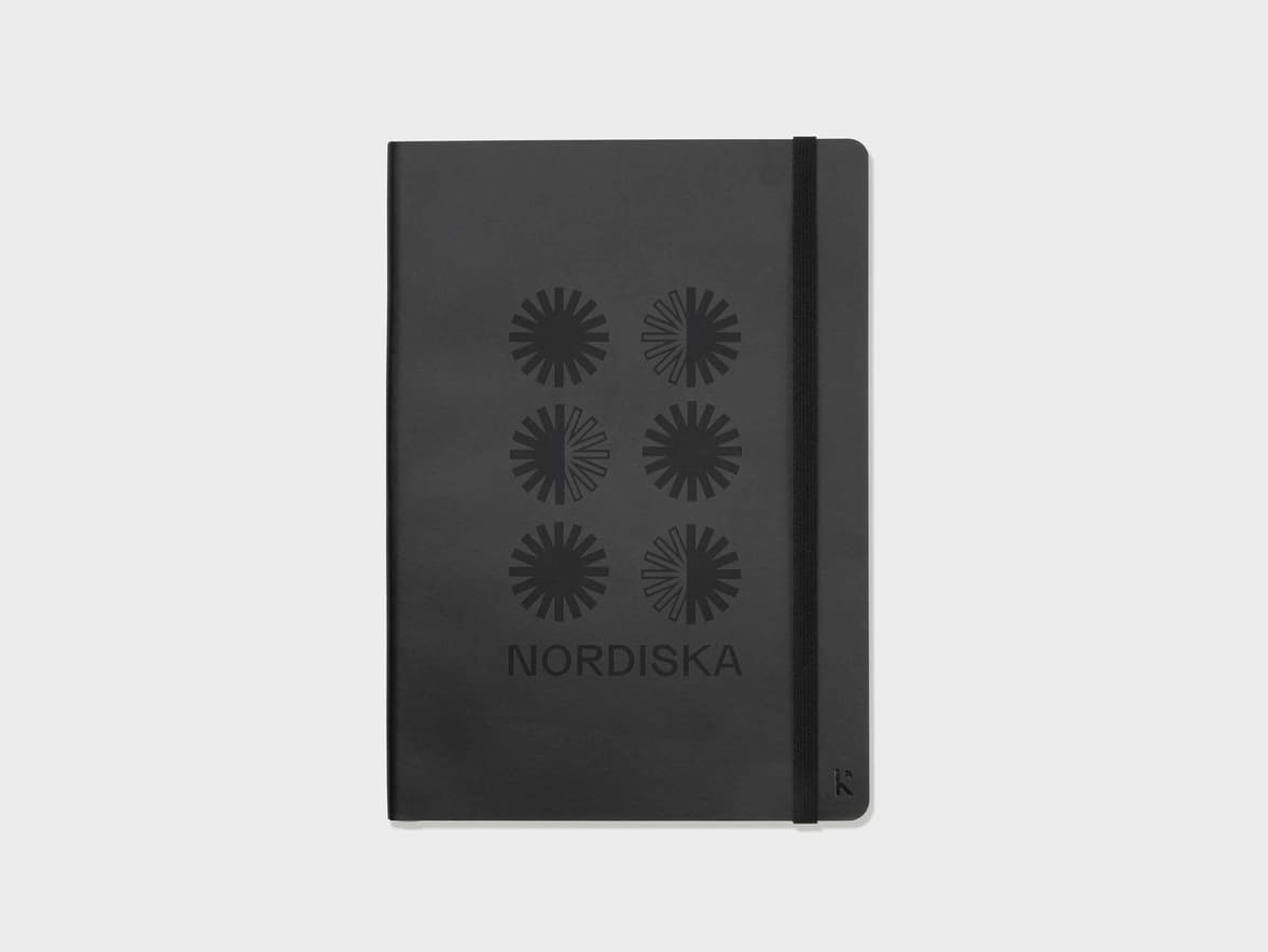 Face on shot of the Black Karst Stone Paper Softcover Notebook with Blind Deboss customization