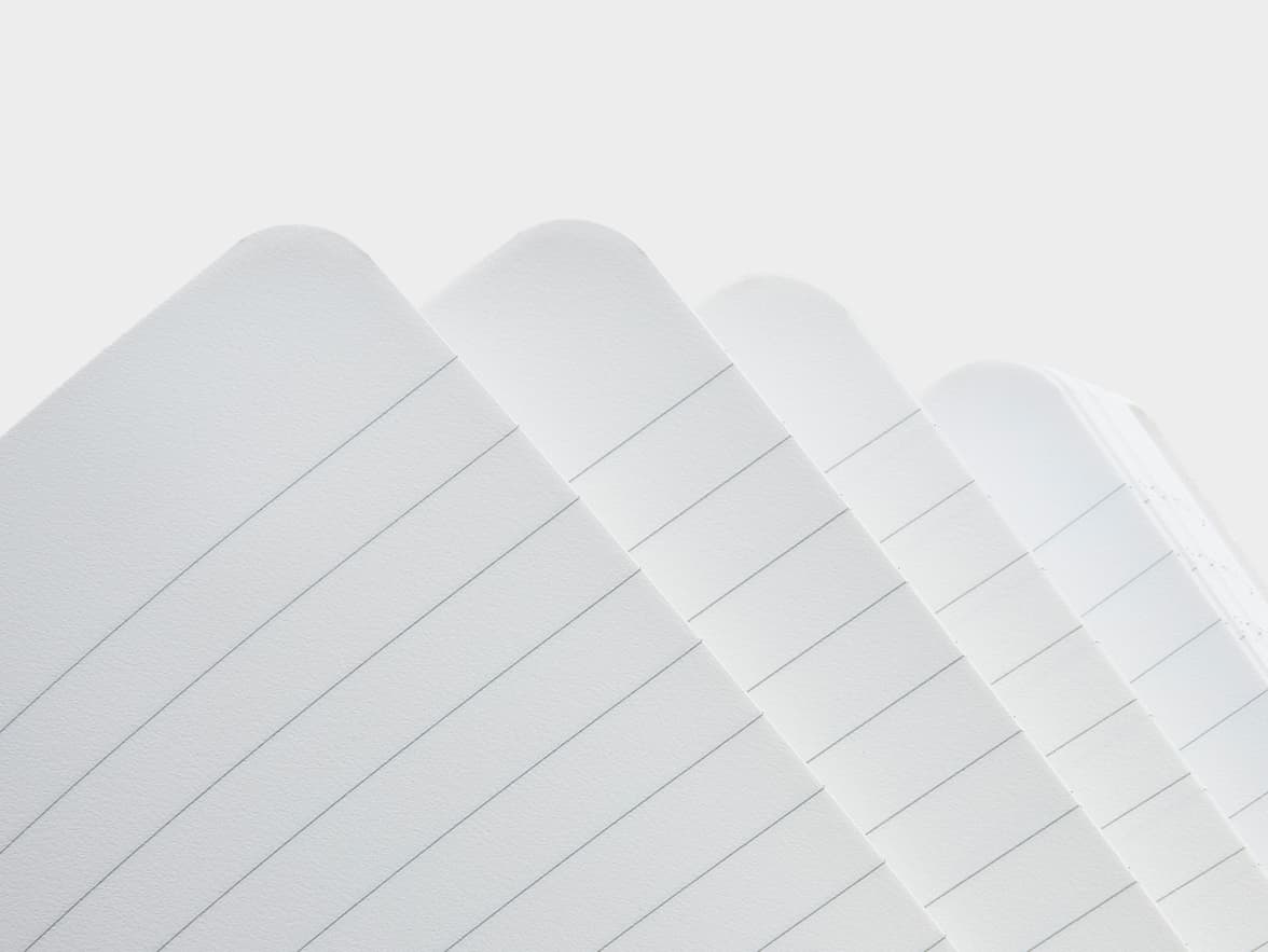Corner shot of the lined pages of the Karst Stone Paper Softcover Notebook