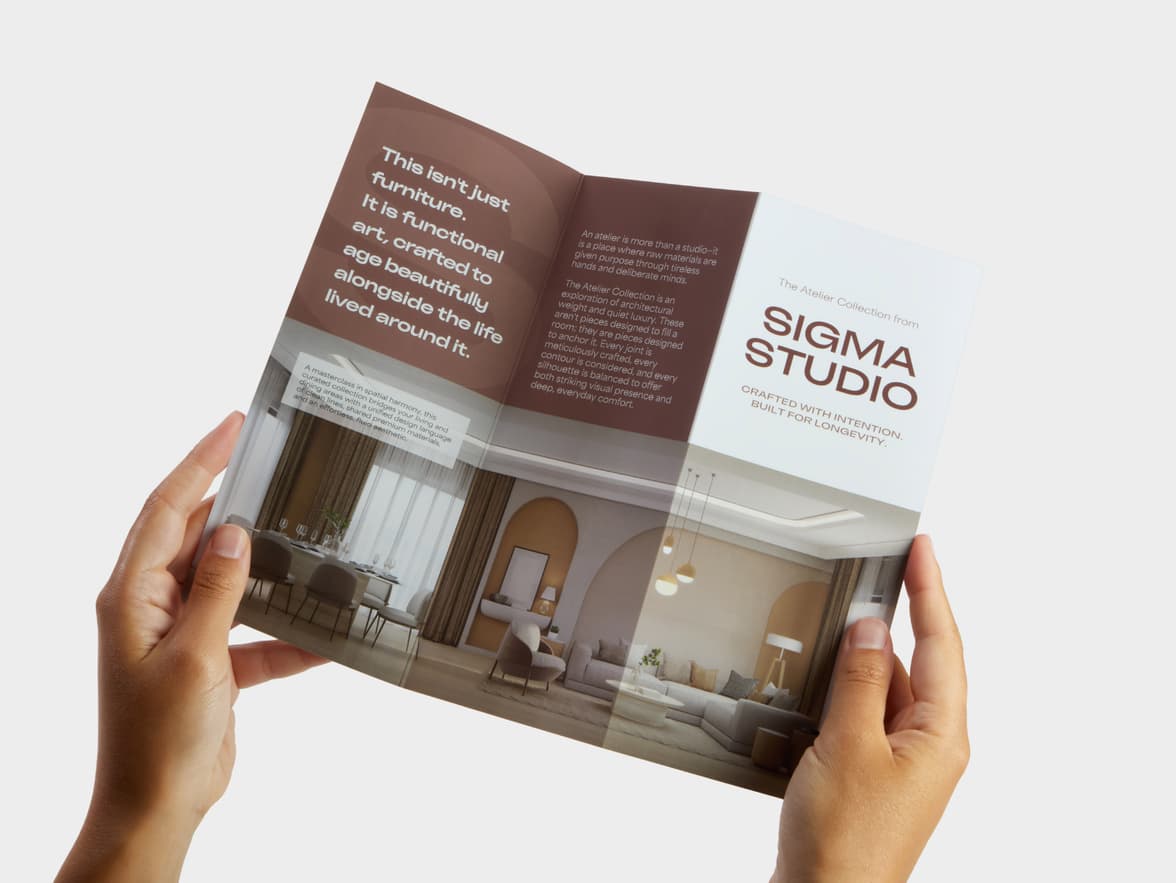 A pair of hands holding open a Z-Fold Super Brochure.